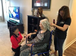 Getting her nails and hair done